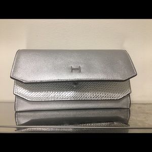 H by HALSTON silver clutch